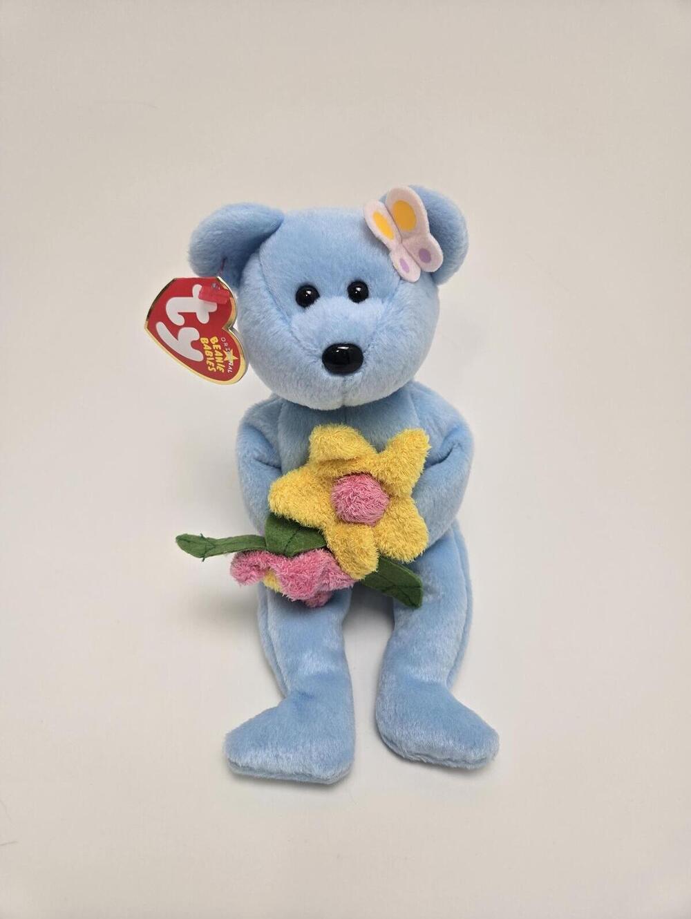 Ty Beanie Baby “Bluebonnet” the Blue Bear Holding Flowers (8.5 inch)